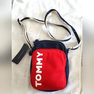 Tommy crossbody navy blue and red. Strap is navy blue and white lite